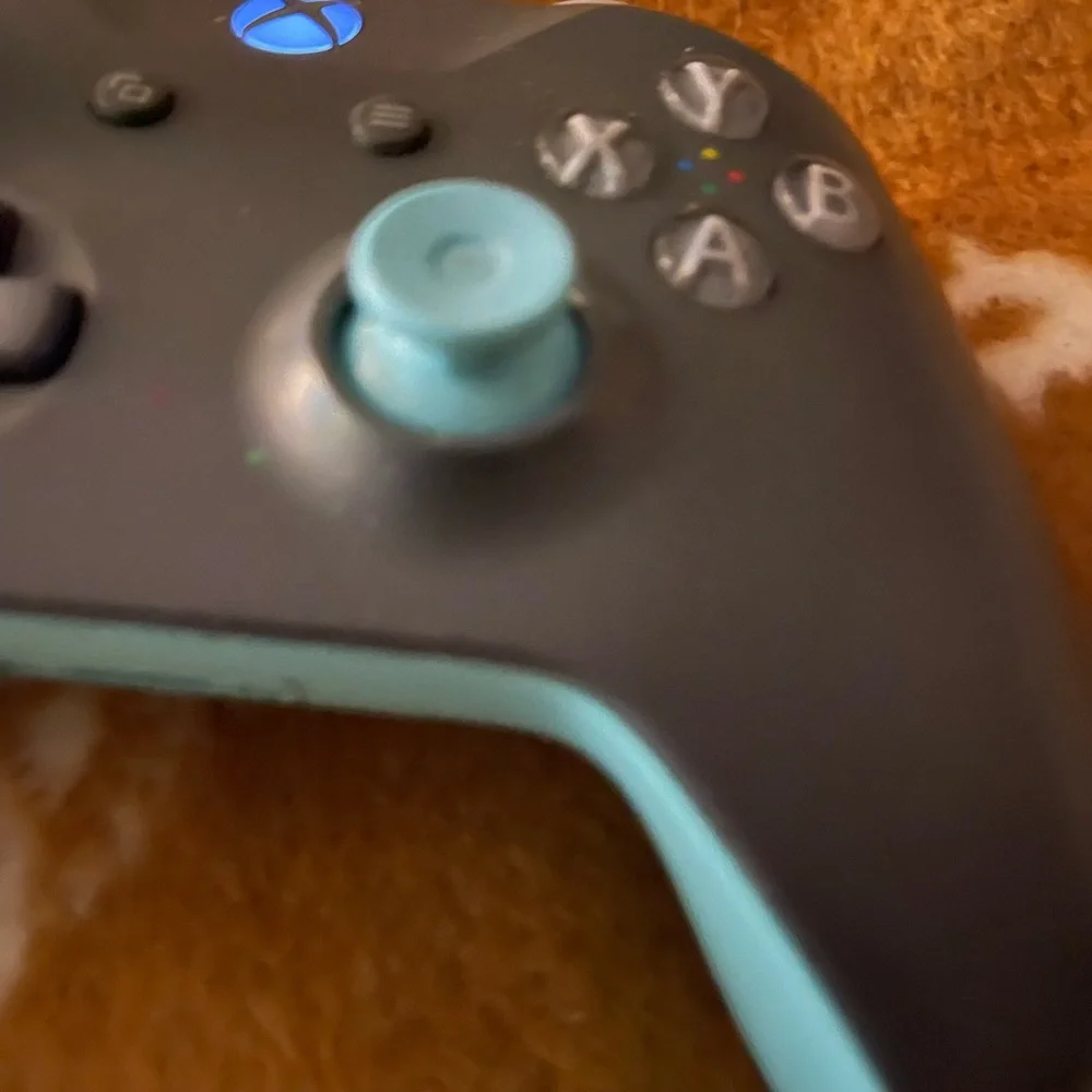 X Box one controller. Missing battery cover and thumb pad. Tested & working fine